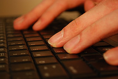 fingers on keyboard